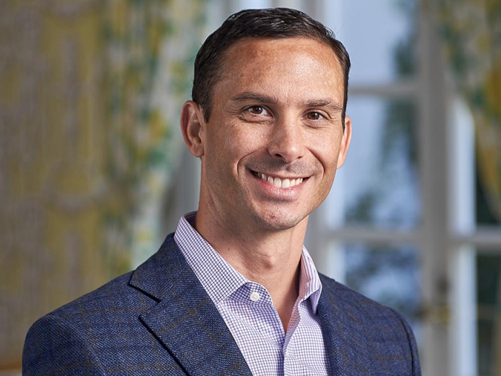 new business development director, pic of man in suit