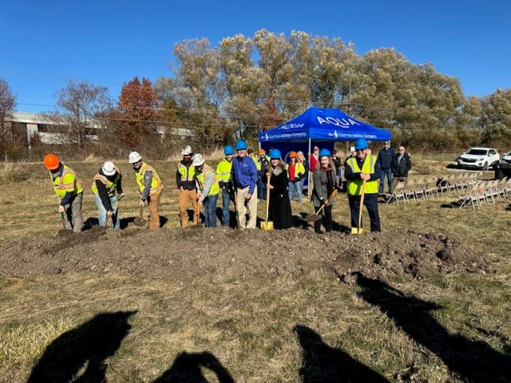 group of people breaking ground for event